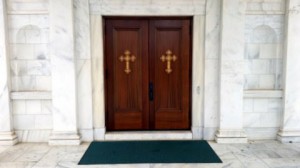 New Hand-carved Crosses now adorn our Church Doors